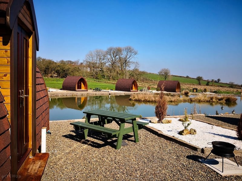 Glamping Pods with outdoor deck area and setting