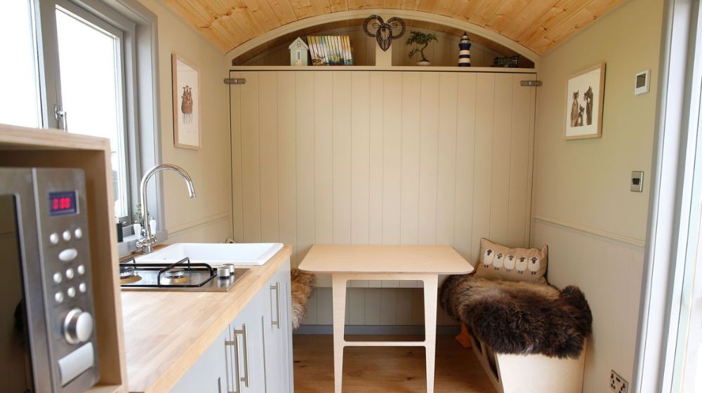 shepherds hut interior dining area